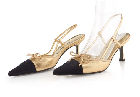 Pair Of Gold Leather And Black Cap Toe Slingback Heels Chanel A