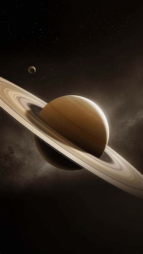 Download Stunning View of Saturn in Space | Wallpapers.com