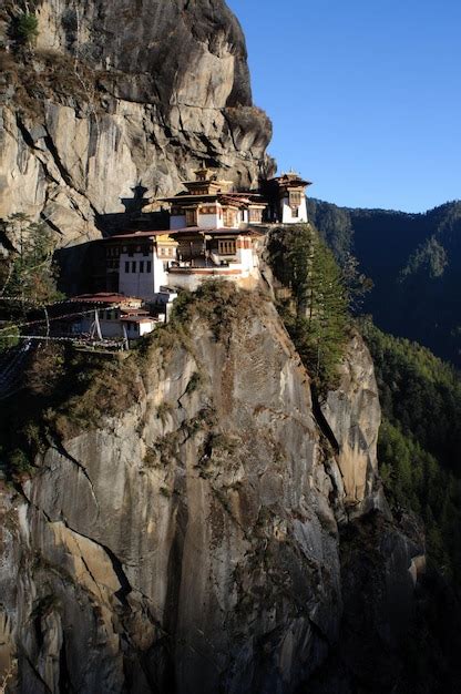 Premium Photo Taktsang Monastery On Mountain Against Sky