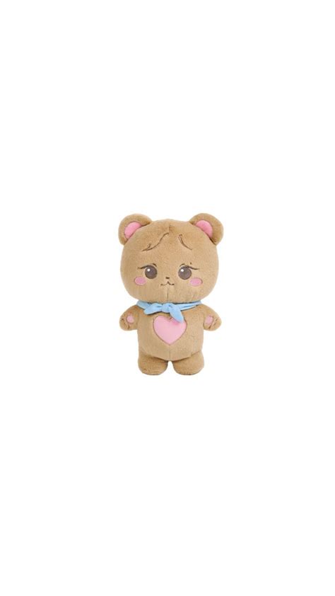 A Brown Teddy Bear With A Pink Heart On Its Chest