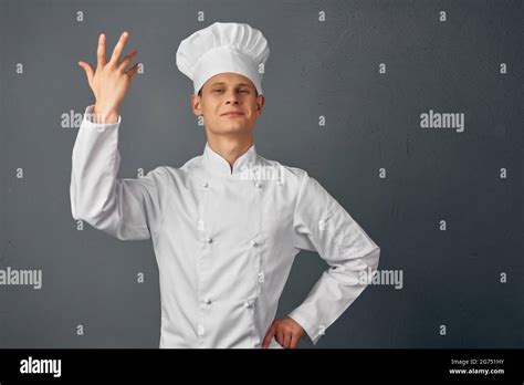 Cheerful Man In Chef S Uniform Raises His Hand Gourmet Restaurant Stock