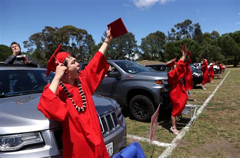 High School Seniors Celebrate Graduation While Socially Distanced In ...