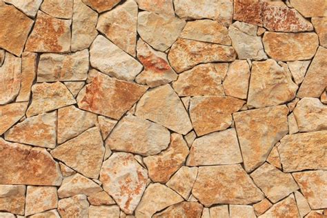 Masonry Stone Wall stock photo. Image of rough, golden - 26804840