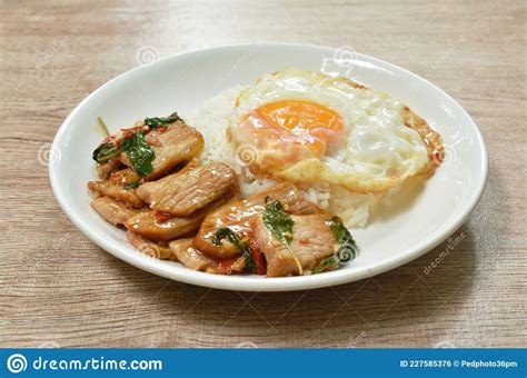 Spicy Stir Fried Slice Grilled Pork With Chili And Basil Leaf Topping