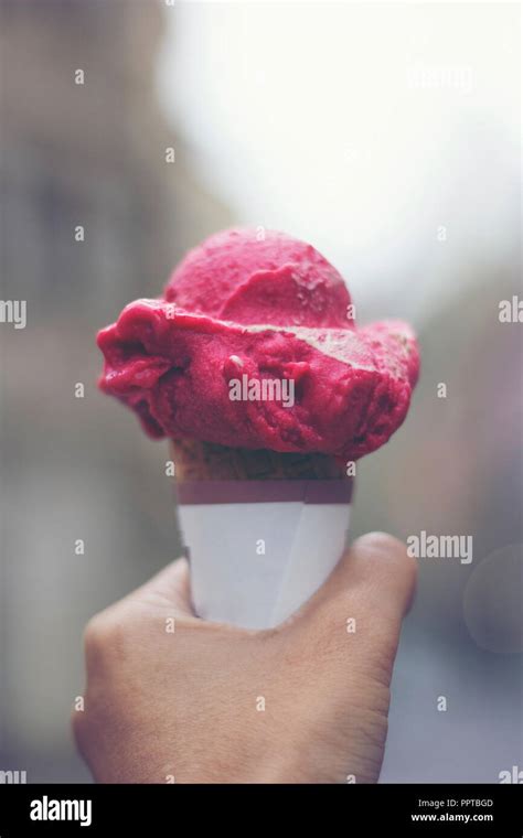 Woman S Hands Holding Melting Ice Cream Waffle Cone In Hands On Summer