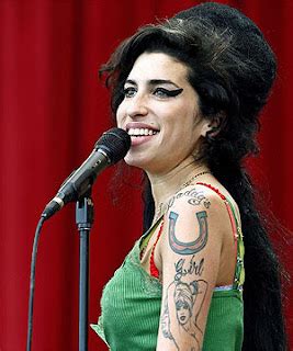 PETE DOHERTY VISITS AMY WINEHOUSE