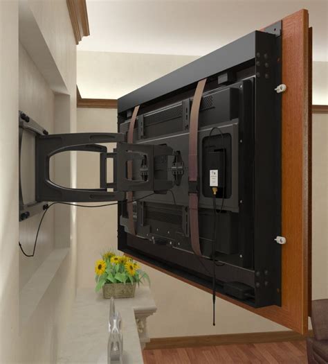 Recessed Tv Using A Swing Arm Mount With The Frame Attached To The Tv