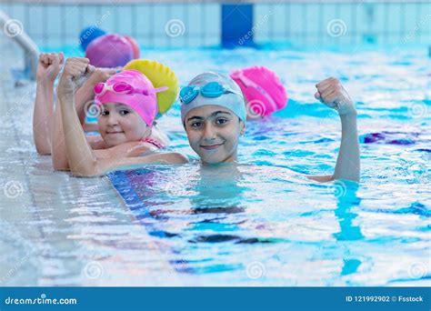 Happy Kids At The Swimming Pool. Young And Successful Swimmers Pose. Stock Photography ...