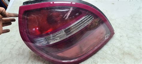 Lampa Tylna Lewa NISSAN ALMERA N16 Hb 12338710902 Oficjalne