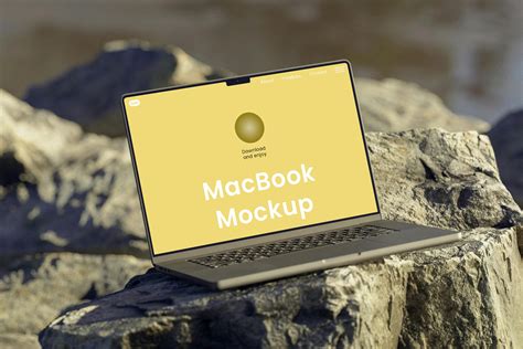 MacBook on Rock Free Mockup — Free Mockup World