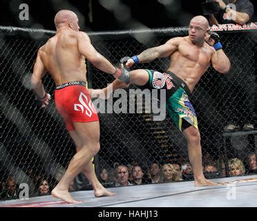 Thiago Alves, right, fights Georges St-Pierre during UFC 100 at the ...