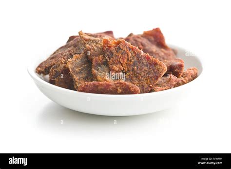 Beef Jerky Pieces Isolated On White Background Marinated Dried Meat