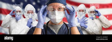 Doctors Or Nurses Wearing Medical Personal Protective Equipment Ppe