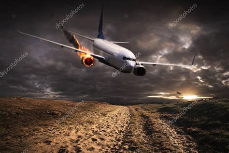 Plane with engine on fire about to crash — Stock Photo © sdecoret ...