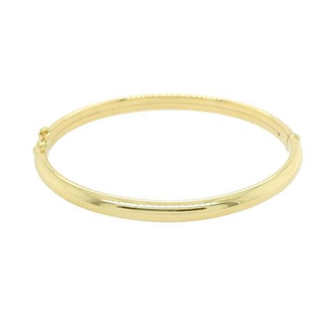 Ct Gold Oval Hinged Openwork Crossover Design Bangle Tb Mitchell