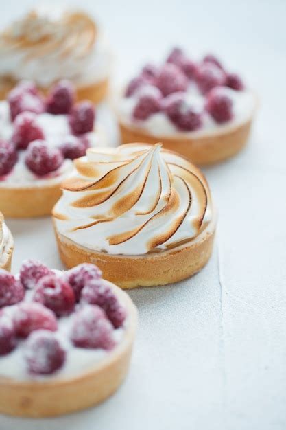 Premium Photo Delicious Lemon And Raspberry Tartlets