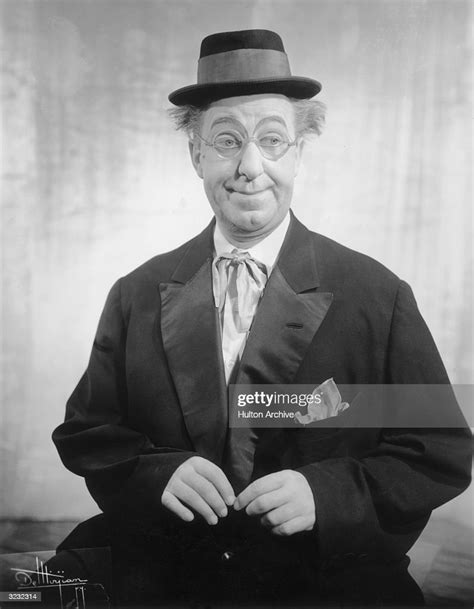 American Actor And Comedian Ed Wynn Is Dressed In An Oversized Jacket