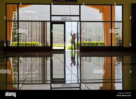 Cleaning window, Kullu airport interior, Himachal Pradesh, India, Asia ...