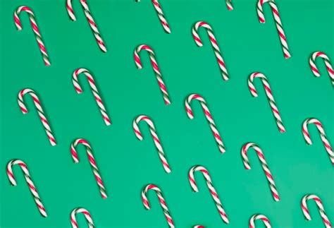 Free Photo Candy Canes On The Green Background