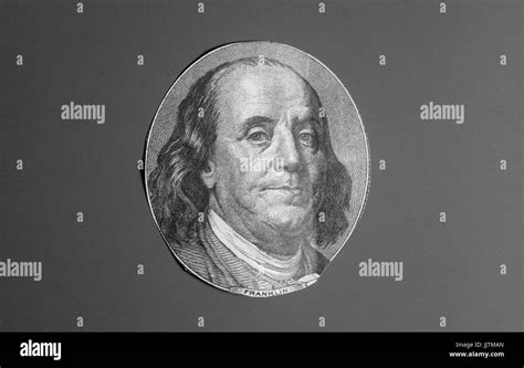 Benjamin franklin face banknote Black and White Stock Photos & Images ...