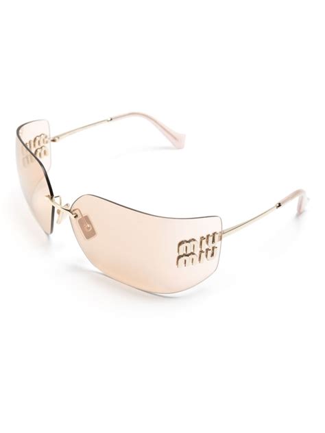 Miu Miu Eyewear Occhiali Da Sole Con Placca Logo Oro FARFETCH IT