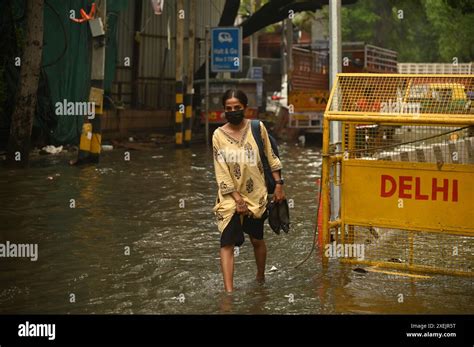 June Delhi New Delhi India Commuters Move Through A Water