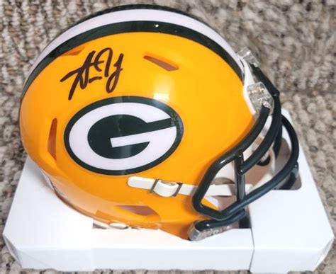 Autographed AARON JONES Green Bay Packers Mini Helmet W Beckett