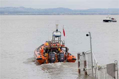 Rnli Lifeboat Crew Launch Rescue Boat To Rescue Migrants In The English