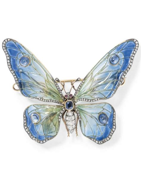 AN ART NOUVEAU ENAMEL DIAMOND AND GEM SET BUTTERFLY BROOCH CIRCA