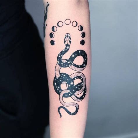 Freehand galactic snake tattoo on the left forearm. | Spine tattoos for women, Tattoos for women ...