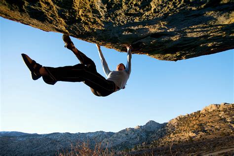 Woman Bouldering On An Overhang 4 Photograph By Corey Rich Fine Art