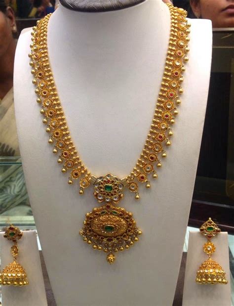 Gold Haram And Jhumkas Set Jewellery Designs