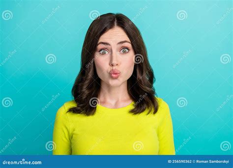 Photo Of Lovely Brunette Hair Millennial Lady Blow Kiss Wear Green Shirt Isolated On Teal Color