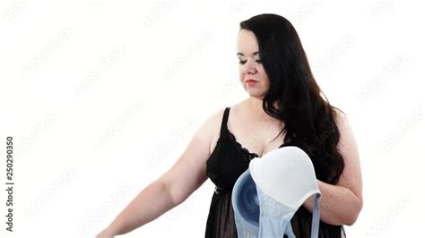 Plus Size Fat Mature Woman Wearing Lace Lingerie Holding Black And