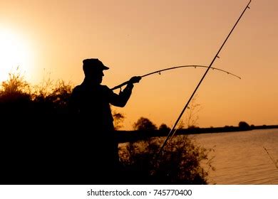 Man Fishing Sunset Stock Photo 745770400 | Shutterstock