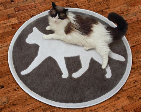 Introduces New Area Rugs With A Feline Theme