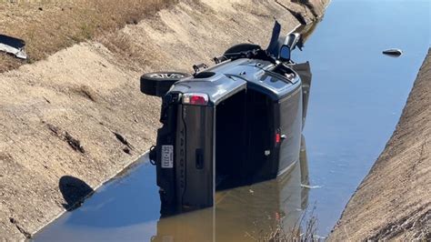 Driver Crawls To Safety After Pickup Veers Off Highway 73 And Lands On