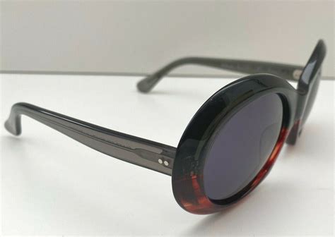 Oliver Goldsmith Audrey Sunglasses Black Plum Frmae Dark Grey Lenses