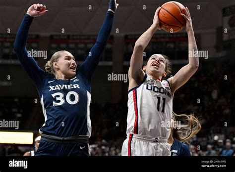 Uconn S Lou Lopez Senechal Looks To Shoot As Xavier S Courtney