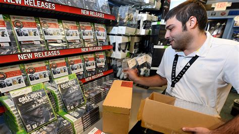 Tech stocks: GameStop climbs off dividend raise