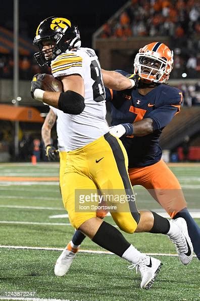 Iowa Hawkeyes tight end Sam LaPorta shakes the tackle of Illinois ...