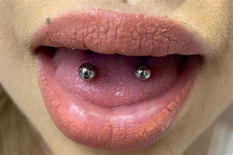 Tongue Piercing Frog Eyes