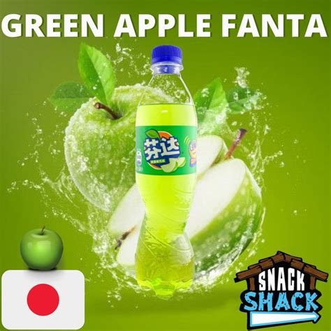 An Advertisement For Green Apple Fanta With Water Splashing On It And Apples In The Background