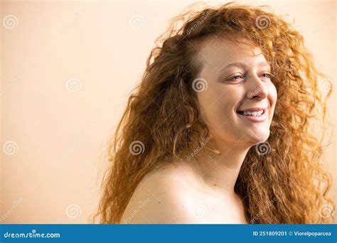 Side View Photo Of A Laughing Happy Redhead Woman With Curls Having Naked Shoulder Posing Over