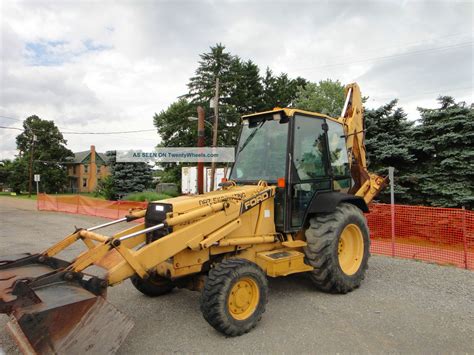 Ford 555 backhoe weight