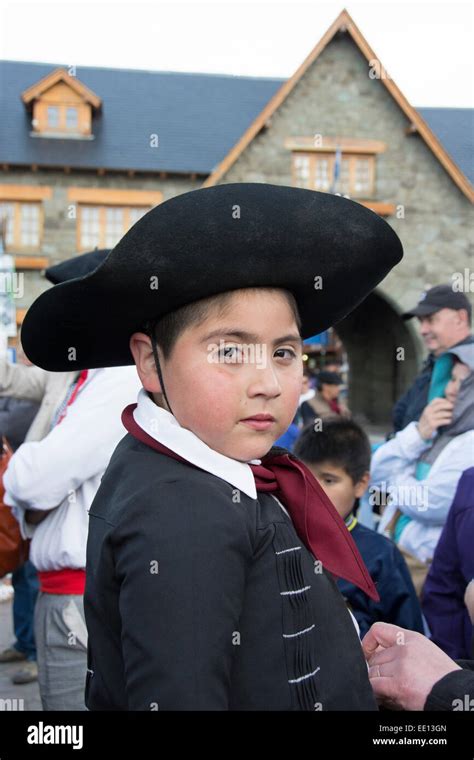 Young gaucho boy dressed in traditional clothing Stock Photo - Alamy