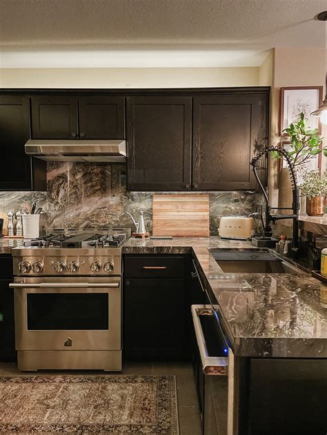 Dark Marble Kitchen - Residential Renovation — Aurora Interiors