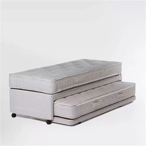 two mattresses sitting on top of each other