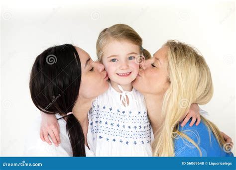Same Sex Mothers Kissing Their Daughter Stock Photo Image Of 10yrs Donation 56069648