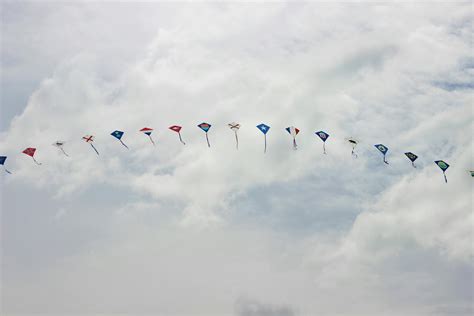 Kites Flying in the Cloudy Sky · Free Stock Photo